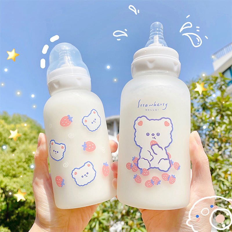 https://kirakiraworld.com/cdn/shop/products/Cute-Cartoon-Strawberry-Bear-Glass-Pacifier-Water-Bottle-Straw-Cup-For-Adult-Children-Milk-Frosted-Bottle-980099.jpg?v=1679115826